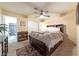 Bright bedroom featuring a comfy bed and access to a bathroom at 2254 High Dunes Ln, Laughlin, NV 89029