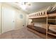 Charming bedroom with a bunk bed and plenty of space at 2254 High Dunes Ln, Laughlin, NV 89029