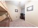 Well-lit bedroom with a bunk bed and entertainment center at 2254 High Dunes Ln, Laughlin, NV 89029