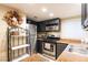 View of a kitchen with dark cabinets, stainless steel appliances, and granite countertops at 2254 High Dunes Ln, Laughlin, NV 89029