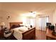 Bright bedroom with wood flooring and a ceiling fan at 2816 Mohawk St, Las Vegas, NV 89146