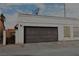 Attached garage with an automatic door opener at 2816 Mohawk St, Las Vegas, NV 89146