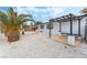 Relaxing patio area with pergola and built-in bench seating at 2824 Bassler St, North Las Vegas, NV 89030