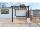 Covered patio area with pergola and stone flooring at 2824 Bassler St, North Las Vegas, NV 89030