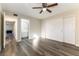 Bright bedroom with access to bathroom and wood-look floors at 2983 Juniper Hills Blvd # 203, Las Vegas, NV 89142