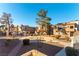 Landscaped courtyard with walkways and seating areas in an apartment complex at 2983 Juniper Hills Blvd # 203, Las Vegas, NV 89142