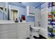 Clean bathroom with white vanity, shower/tub combo at 3123 Logan Ave, North Las Vegas, NV 89032