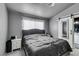 Main bedroom with ensuite bathroom and sliding door at 3123 Logan Ave, North Las Vegas, NV 89032