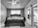 Main bedroom with sliding barn door to ensuite bathroom at 3123 Logan Ave, North Las Vegas, NV 89032