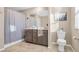 Bathroom with double vanity, shower, and toilet at 3296 Palindrome Ave, Henderson, NV 89044