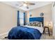 Bedroom with a queen-size bed and blue bedding at 3296 Palindrome Ave, Henderson, NV 89044