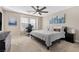 Spacious main bedroom with king-size bed and a walk-in closet at 3296 Palindrome Ave, Henderson, NV 89044