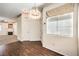 Bright dining area with hardwood floors and a decorative light fixture at 3320 S Fort Apache Rd # 125, Las Vegas, NV 89117