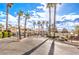 Community entrance with gated access and landscaping at 3320 S Fort Apache Rd # 125, Las Vegas, NV 89117