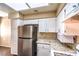 Kitchen with stainless steel appliances and granite counters at 3320 S Fort Apache Rd # 125, Las Vegas, NV 89117