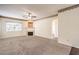 Living room with a fireplace and neutral color palette at 3320 S Fort Apache Rd # 125, Las Vegas, NV 89117