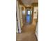 Clean hallway with tile flooring and access to bedrooms and bathroom at 3330 Trotting Horse Rd, North Las Vegas, NV 89032