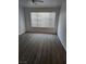 Bedroom with vinyl flooring and window coverings at 3425 E Russell Rd # 265, Las Vegas, NV 89120