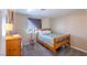 Cozy bedroom featuring carpet, natural light and neutral paint at 433 Jubilation Dr, Las Vegas, NV 89145