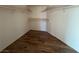 Walk-in closet with wood-look flooring and ample shelving at 4419 S Glory Vine Ln, Pahrump, NV 89061