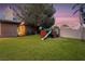 Grass backyard with playset and plenty of space to play at 478 Spanish View Ln, Las Vegas, NV 89110