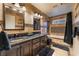 Elegant bathroom with double sinks, soaking tub, and dark wood cabinets at 478 Spanish View Ln, Las Vegas, NV 89110