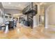 Elegant dining room with spiral staircase and high ceilings at 478 Spanish View Ln, Las Vegas, NV 89110