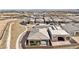 Aerial view showcasing a house and surrounding neighborhood at 4973 Sandline Ct, Las Vegas, NV 89135