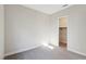 Bedroom with a walk-in closet and neutral color scheme at 4973 Sandline Ct, Las Vegas, NV 89135