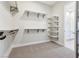 Large walk-in closet with ample shelving and hanging space at 4973 Sandline Ct, Las Vegas, NV 89135