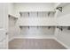 Large walk-in closet with double hanging rods at 4973 Sandline Ct, Las Vegas, NV 89135