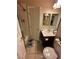 Bright bathroom with a toilet, sink, and bathtub at 5016 Wayfaring Tree Ave, Las Vegas, NV 89131