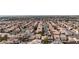 Expansive aerial view of a residential neighborhood featuring uniform homes and well-maintained streets at 5028 Frozen Springs Ct, Las Vegas, NV 89130