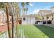 This large backyard features artificial turf and a shed at 5028 Frozen Springs Ct, Las Vegas, NV 89130