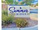 Summer Ridge community sign with lush greenery and desert landscape at 5028 Frozen Springs Ct, Las Vegas, NV 89130