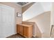 Second floor hallway with closet, storage cabinets, and leading to additional bedrooms at 5028 Frozen Springs Ct, Las Vegas, NV 89130