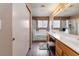 Spacious bathroom with dual sinks, a walk-in shower, and ample counter space at 5028 Frozen Springs Ct, Las Vegas, NV 89130