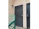 Condo building entrance with security gate and walkway at 510 Elm Dr # 205, Las Vegas, NV 89169