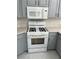 Kitchen with microwave, oven and gas stove at 5225 W Reno Ave # 129, Las Vegas, NV 89118