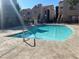 Community pool with clean blue water and plenty of seating at 5225 W Reno Ave # 129, Las Vegas, NV 89118