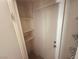 White closet with three shelves at 5350 Rod Ct # 202, Las Vegas, NV 89122