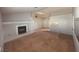 Living area with fireplace and access to kitchen at 5350 Rod Ct # 202, Las Vegas, NV 89122