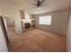 Living room features a fireplace and built-in shelving at 5350 Rod Ct # 202, Las Vegas, NV 89122