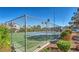 Community tennis court with chain link fence at 5350 Rod Ct # 202, Las Vegas, NV 89122