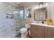 Clean bathroom with a large walk-in shower and modern vanity at 5992 Genovese Ave, Las Vegas, NV 89141