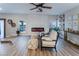 Living room with modern fireplace and comfortable seating at 5992 Genovese Ave, Las Vegas, NV 89141