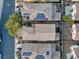 Aerial view of rooftops with solar panels on a residential street at 6178 Pisan Ln, Las Vegas, NV 89148