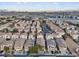 An aerial view of a neighborhood featuring similar two-story homes with desert landscaping at 6178 Pisan Ln, Las Vegas, NV 89148