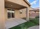 Covered back patio with minimal landscaping at 6178 Pisan Ln, Las Vegas, NV 89148