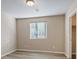 Well lit bedroom featuring a window and closet at 6178 Pisan Ln, Las Vegas, NV 89148